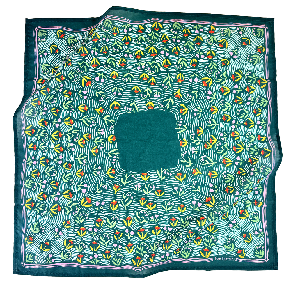 Green patterned bandana with colorful floral design on a white background