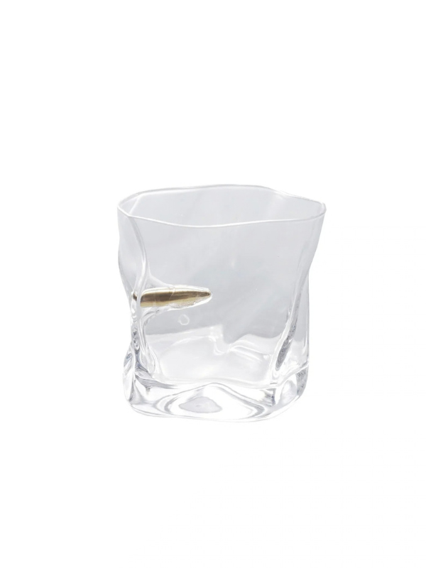 Clear glass whiskey glass with a gold accent bullet 