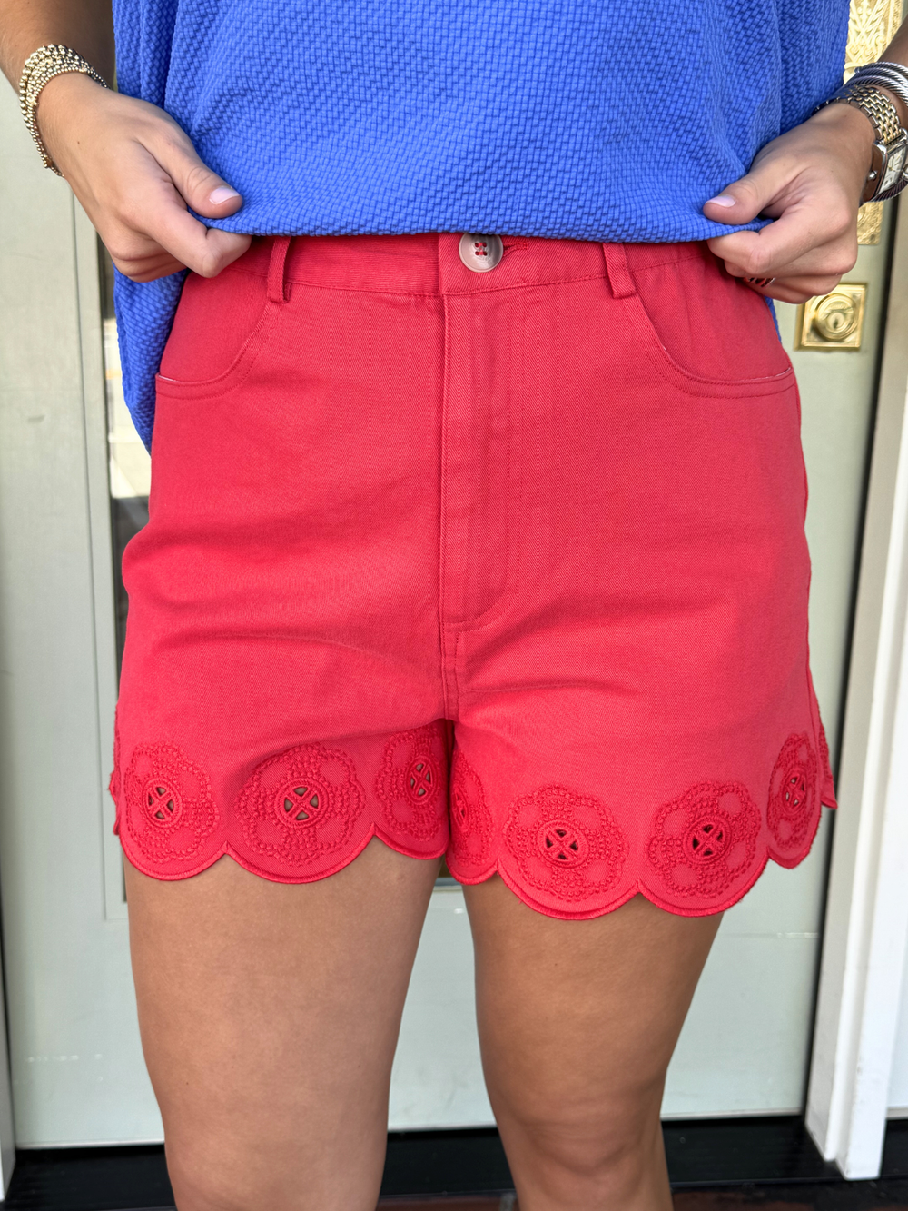 red scalloped shorts
