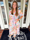 Colorful floral midi dress with subtle puff sleeves and pockets