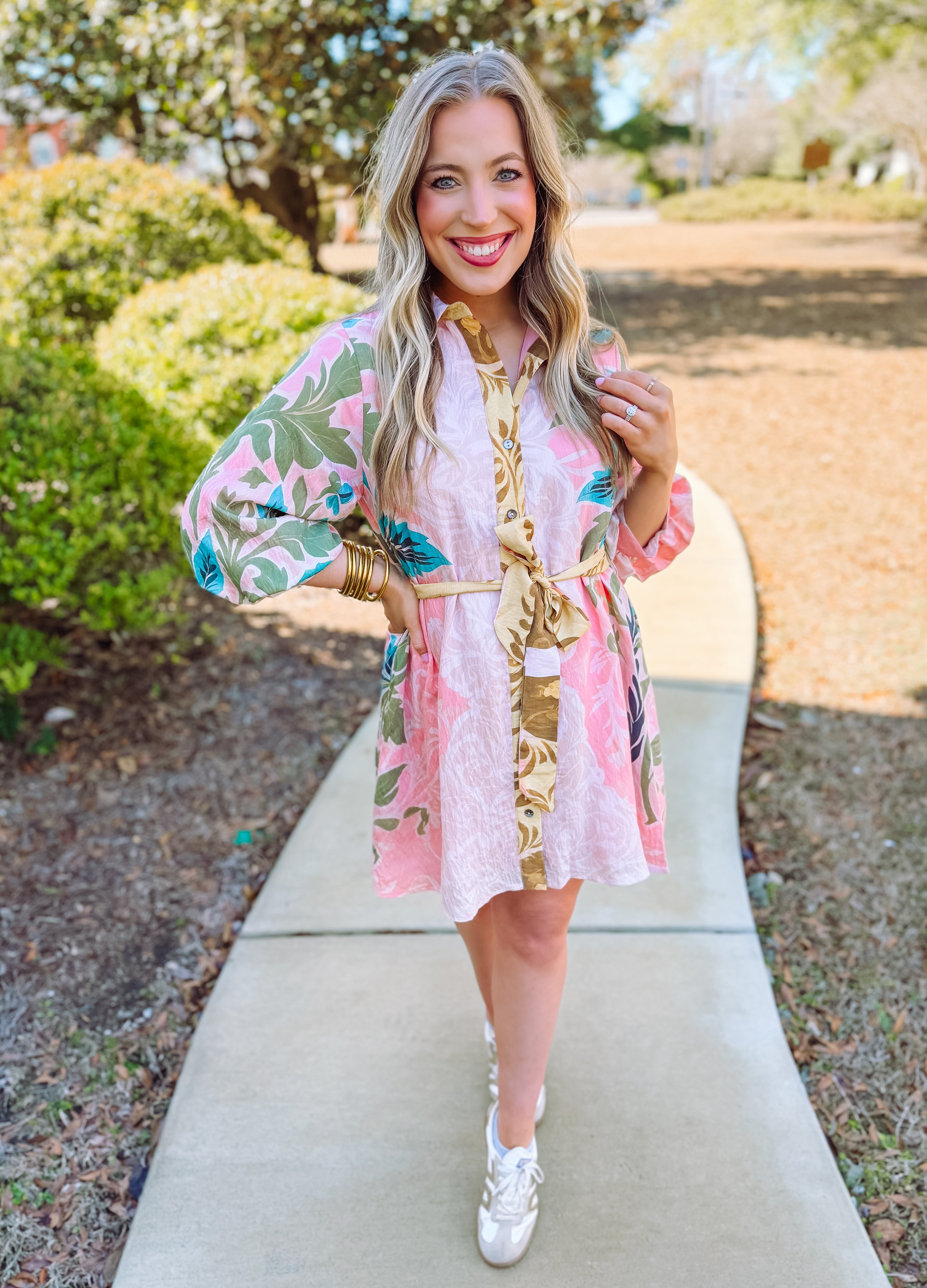 Colorful botanical print dress with buttons down the front and tie front.