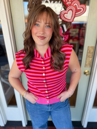 Red and pink striped top with buttons down the front 