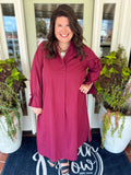 This midi dress features a classic collared neckline with button detailing at the front and an easy relaxed silhouette.