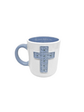 blue cross on a white mug