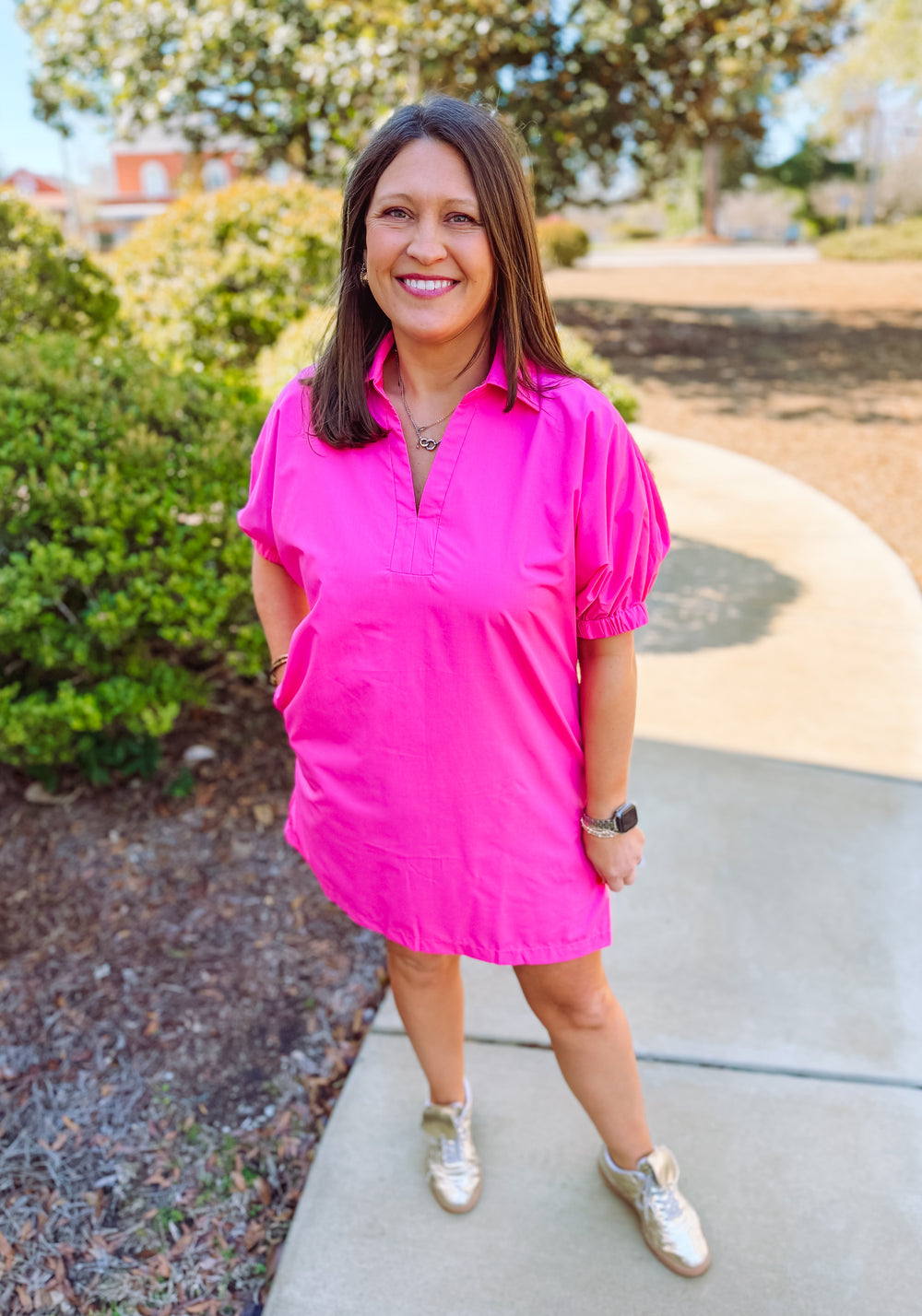 Bright pink dress with v-neck and pockets