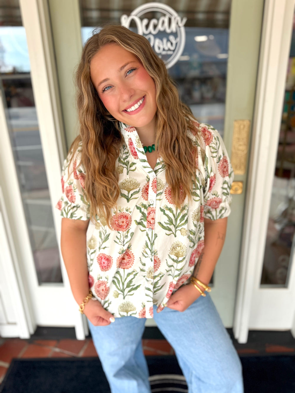 Floral smocked neck short sleeve blouse