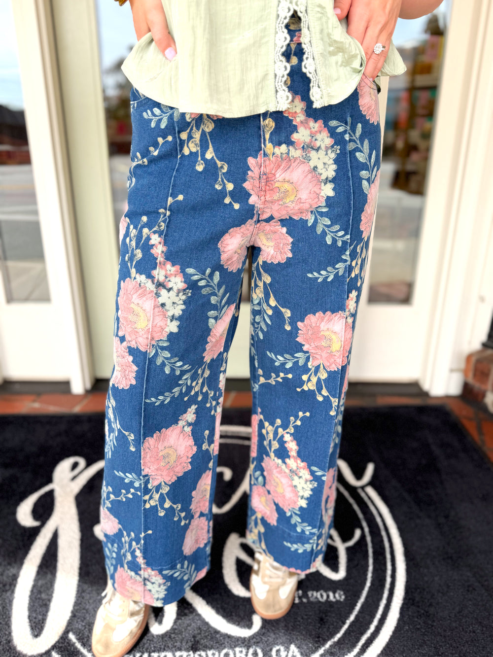Vintage floral inspired pants with a decorative seam going down the front 