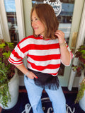 Red and white striped knit oversized short sleeve sweater top with ribbed edging