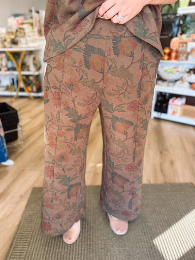  These chocolate brown pants feature the same muted, vintage-inspired floral print in rich olive, rust, and burgundy tones. 