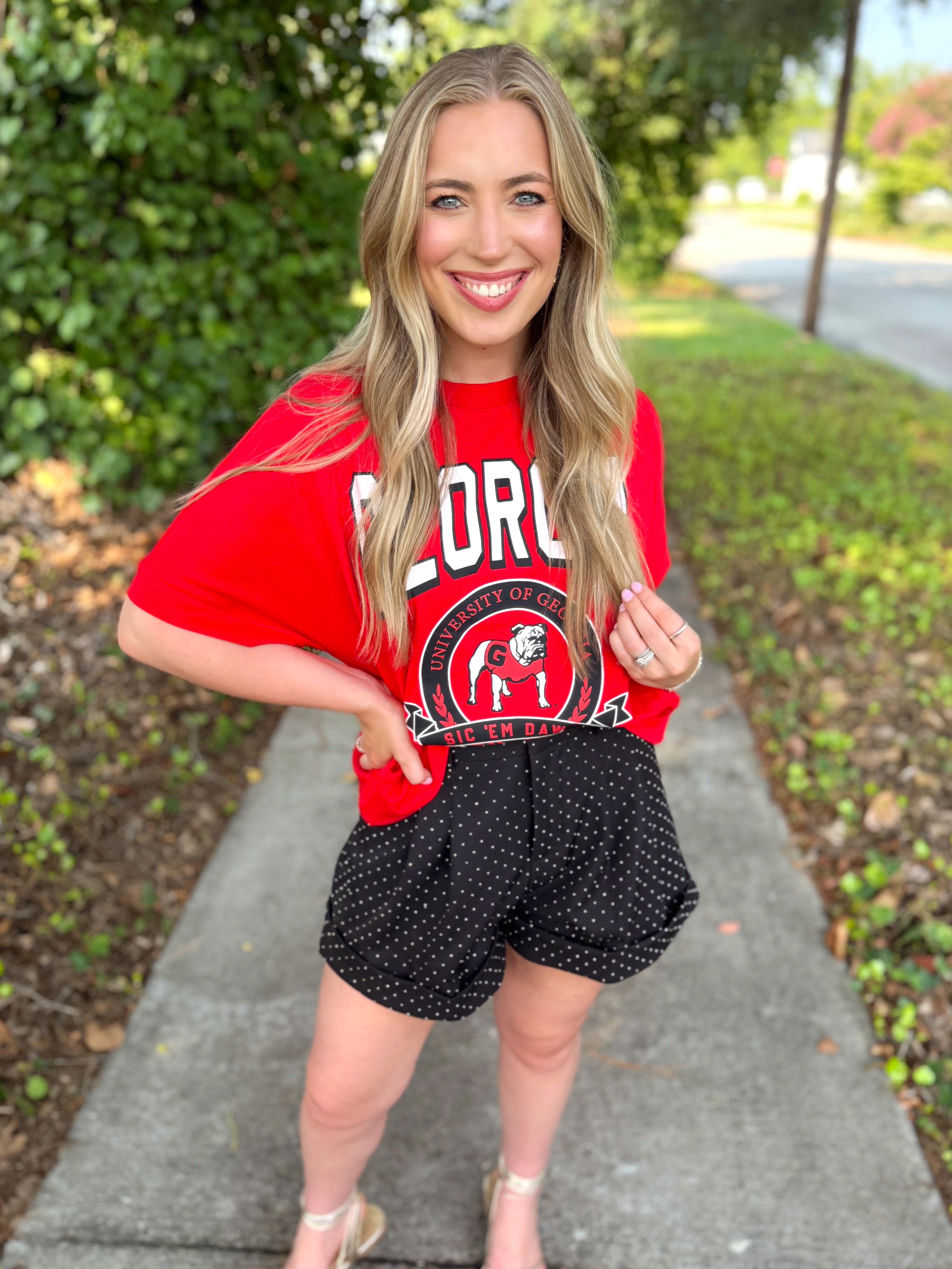 A UGA red graphic T-shirt with white lettering 