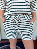 Green striped shorts with drawstring and elastic band