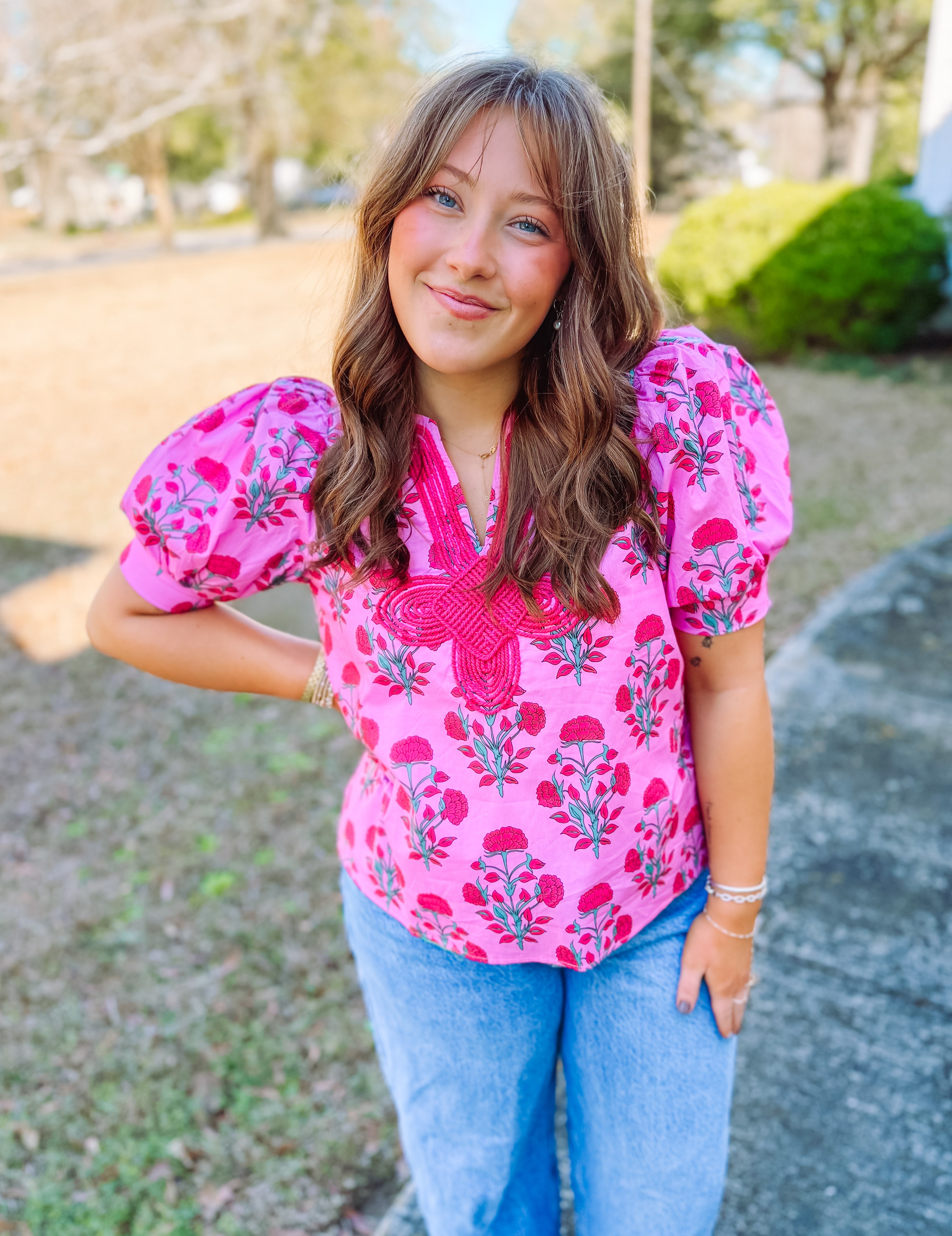 Pink floral blouse with puff sleeves