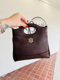 brown woven hand bag with long chain strap