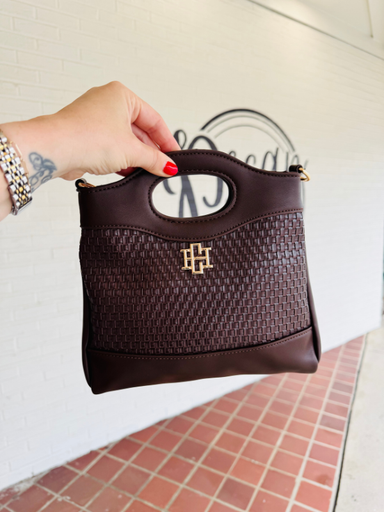 brown woven hand bag with long chain strap