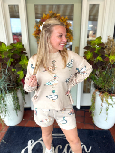 Oatmeal color long sleeve top with printed mallard duck all over it 
