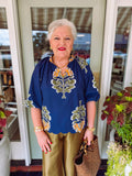 Navy floral printed blouse with v-neckline and 3/4 length sleeves