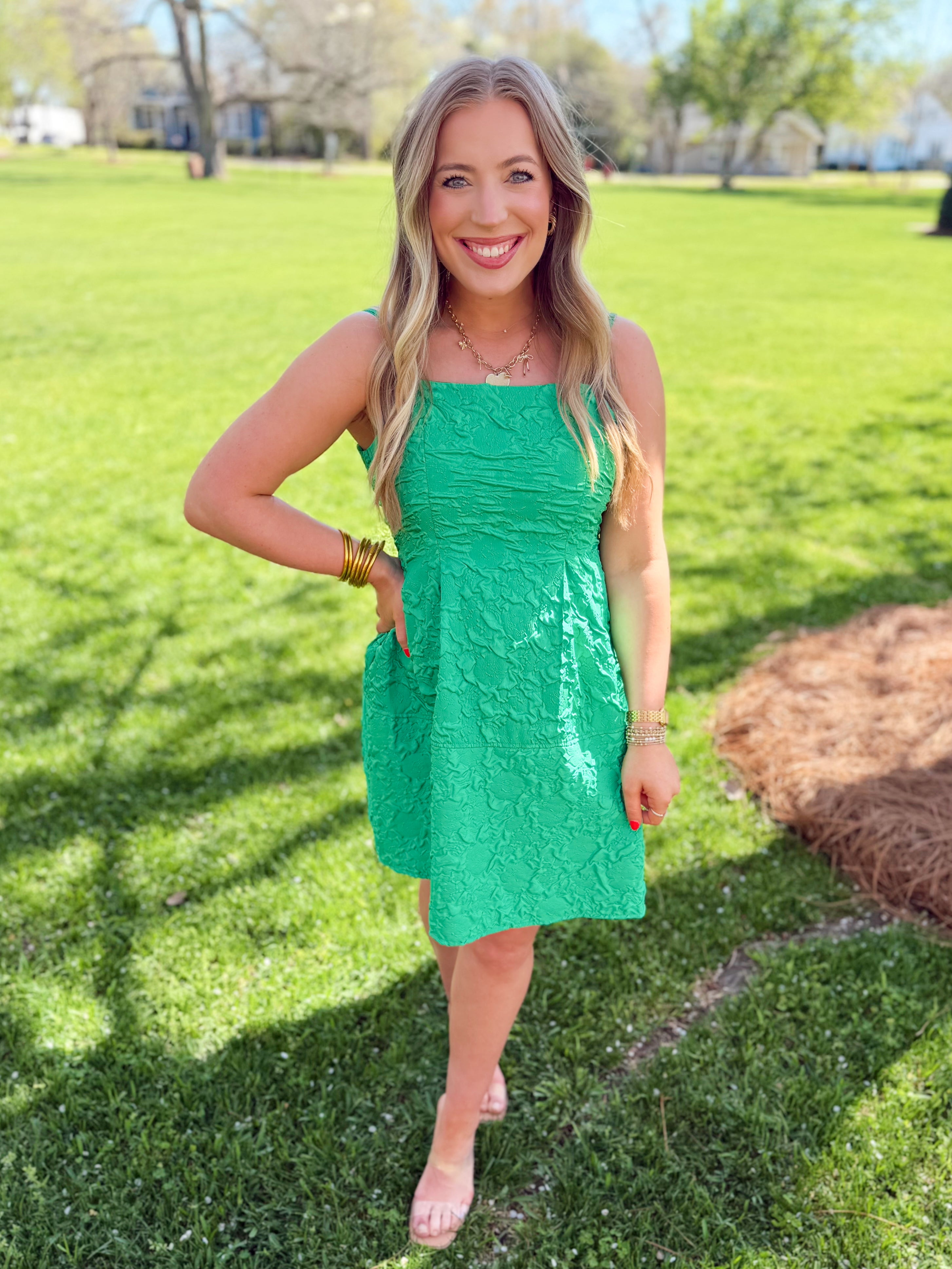 Textured green mini dress with adjustable straps