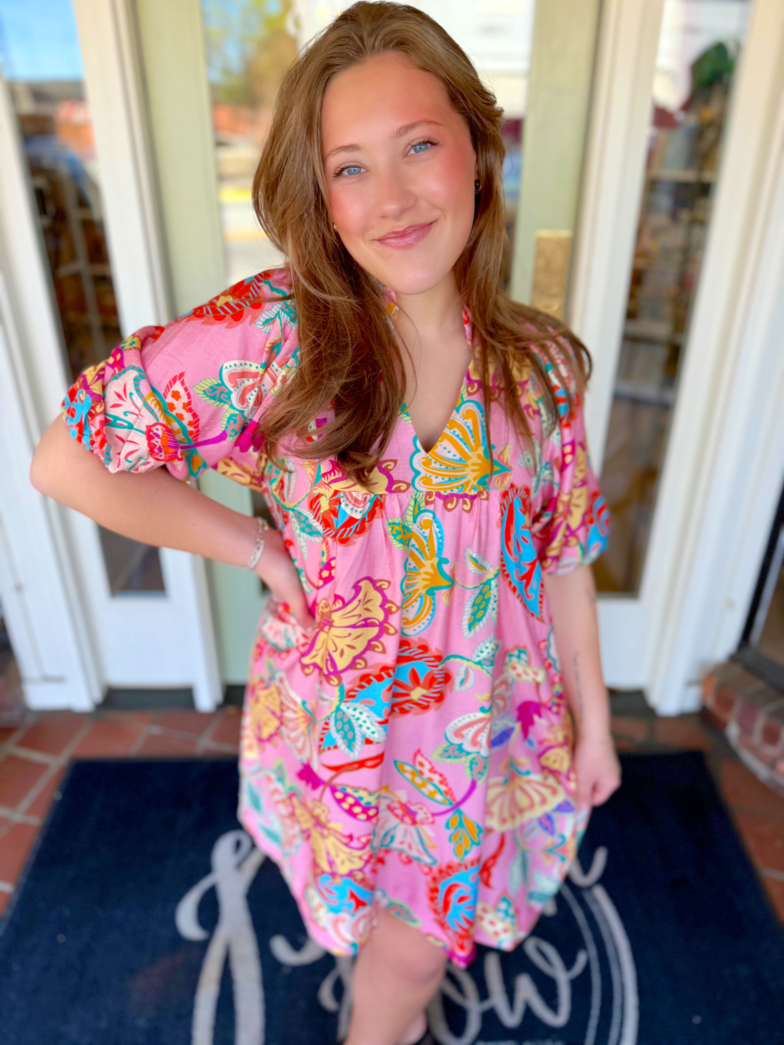 Pink dress with colorful floral print 