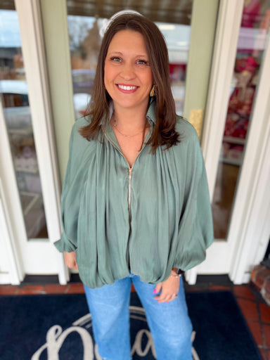 Green gathered hem jacket with gold zipper