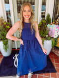 Navy eyelet midi dress with a tiered detailing 