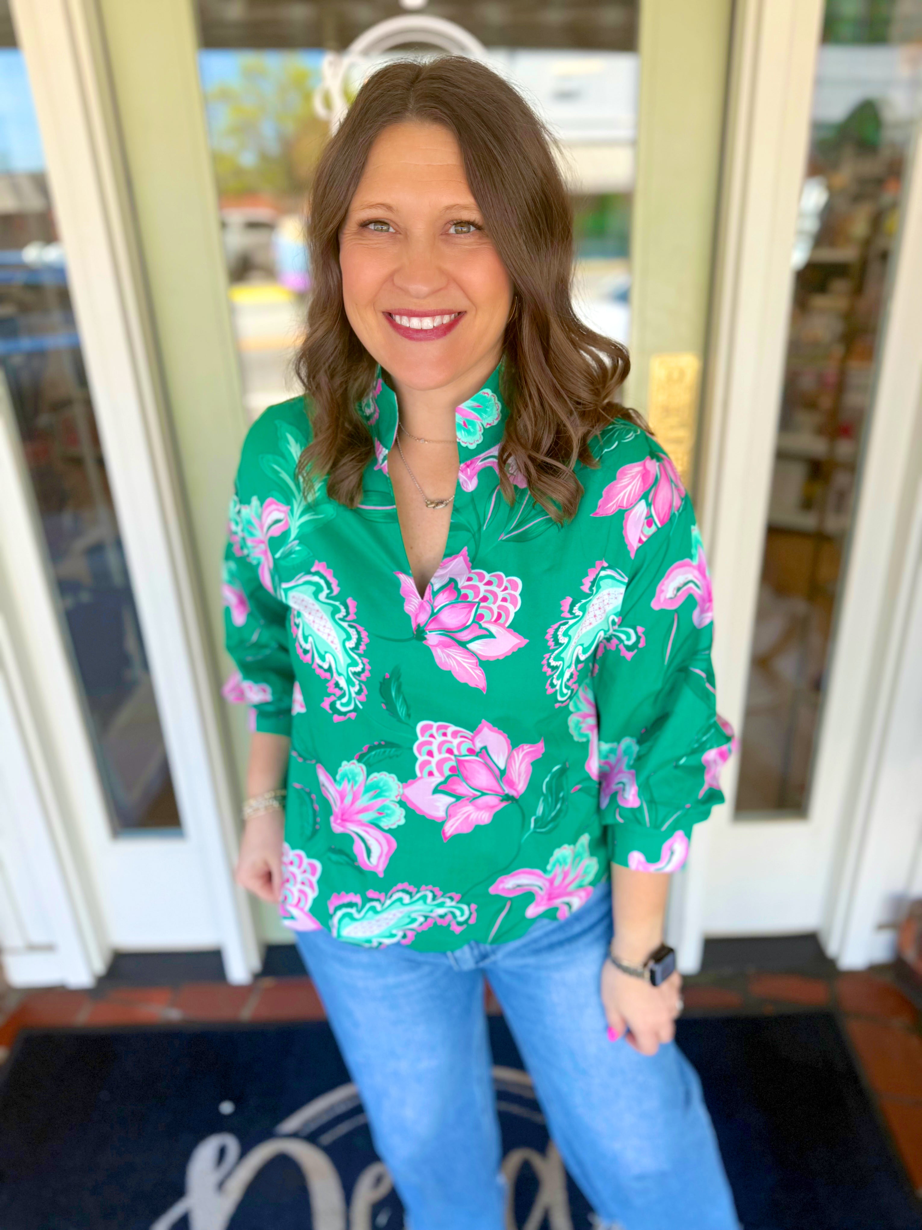 Green v-neck top with pink florals 