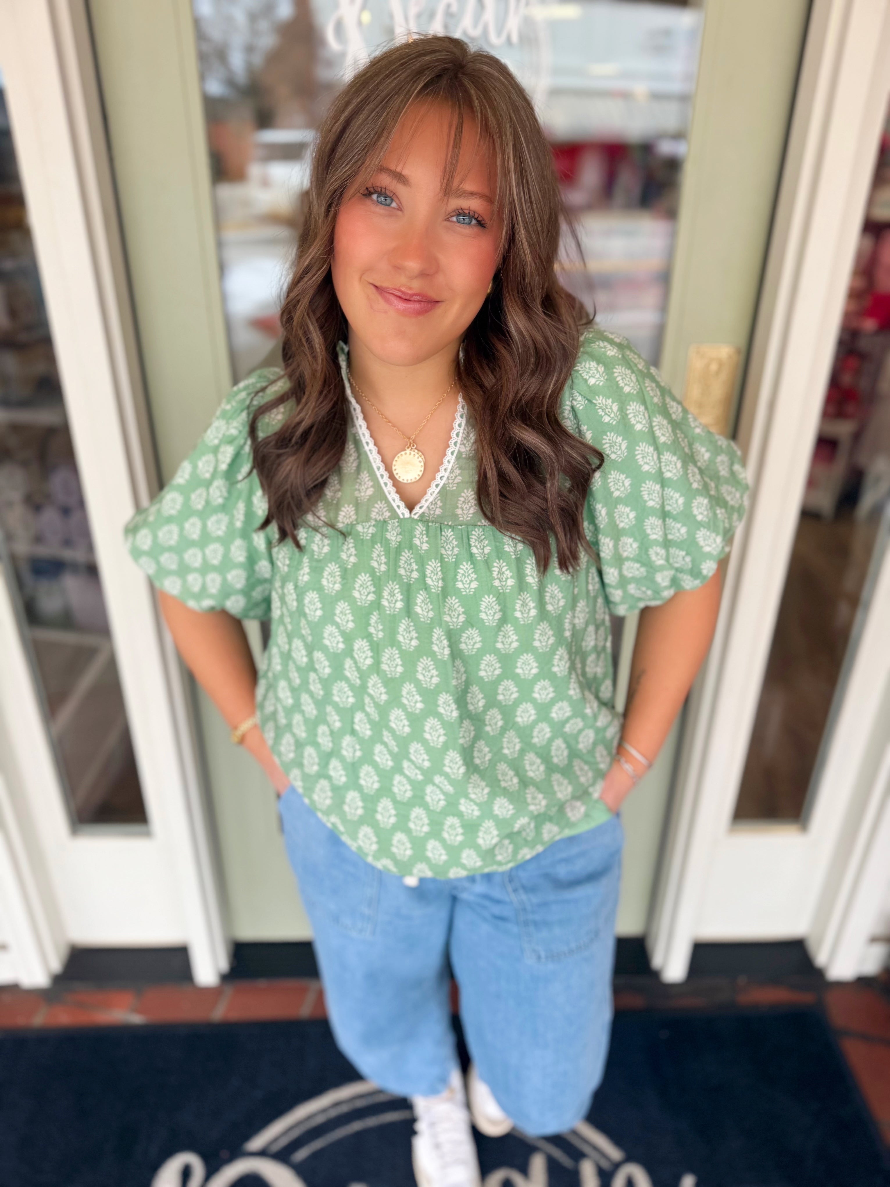 Green patterned blouse with elastic arms 