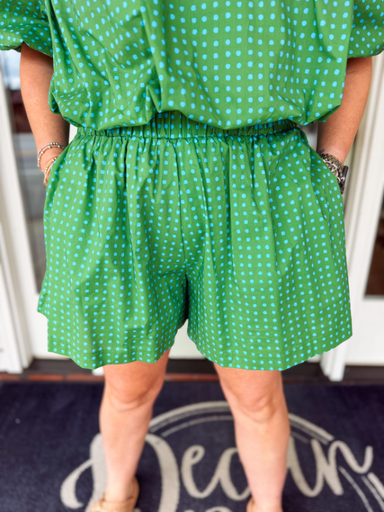 green bottoms with blue polka dots