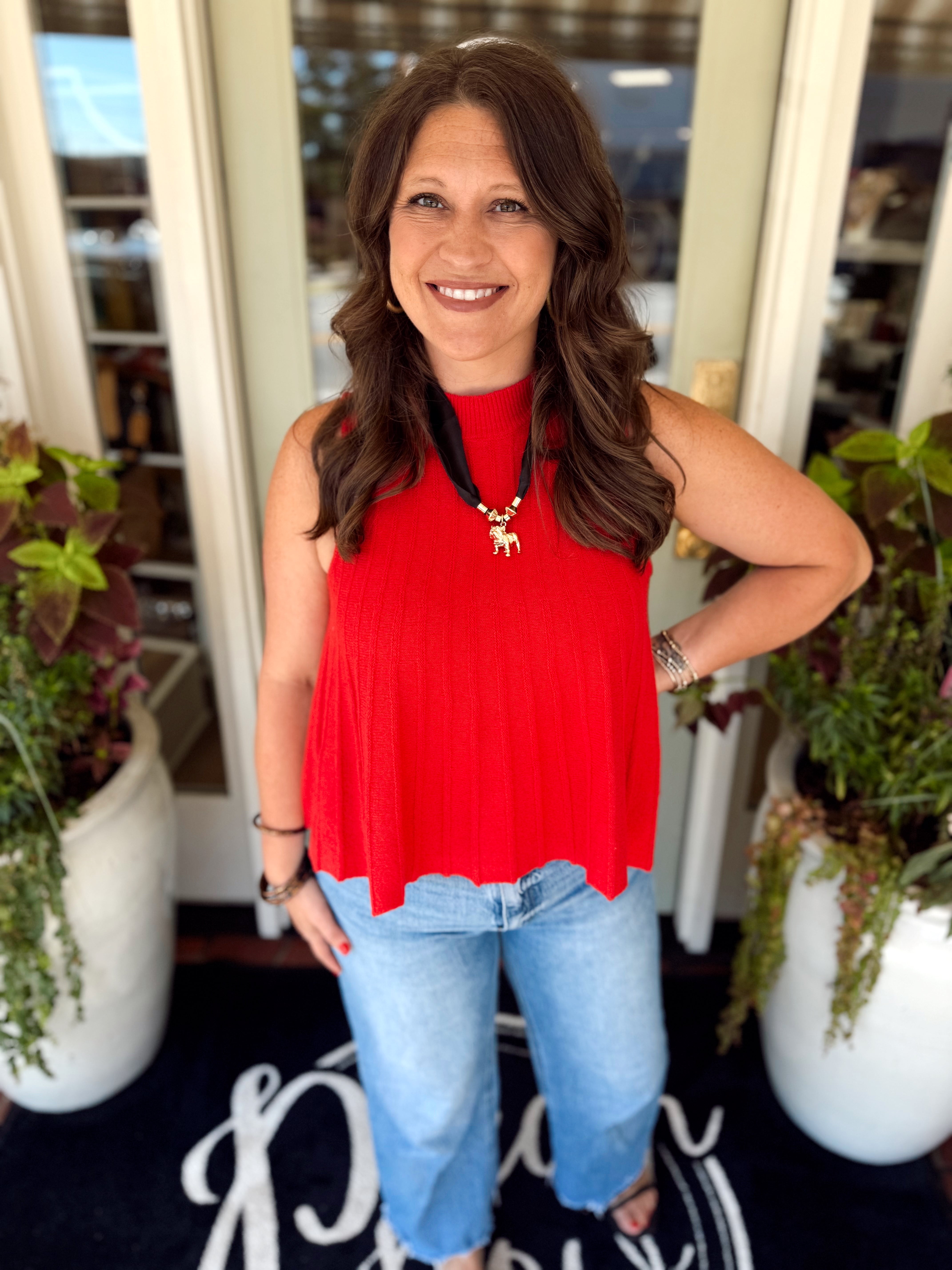 Red ribbed sleeveless sweater 