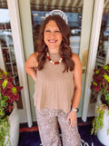 Taupe ribbed sweater knit vest with a mock neckline