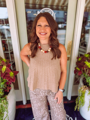 Taupe ribbed sweater knit vest with a mock neckline