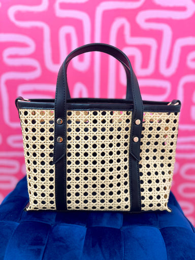 Woven handbag with black handles