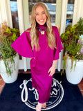 A straight satin plum drop sleeve dress  with a tie detail on the back