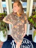 This short sleeve dress features a washed denim look with an allover floral print for a fun, feminine twist.