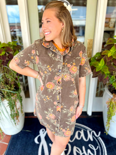This short sleeve dress features a washed denim look with an allover floral print for a fun, feminine twist.