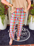 Elastic waist multi color plaid pants with ruffle detailing at the bottom