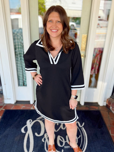 Black dress with contrasting white trim