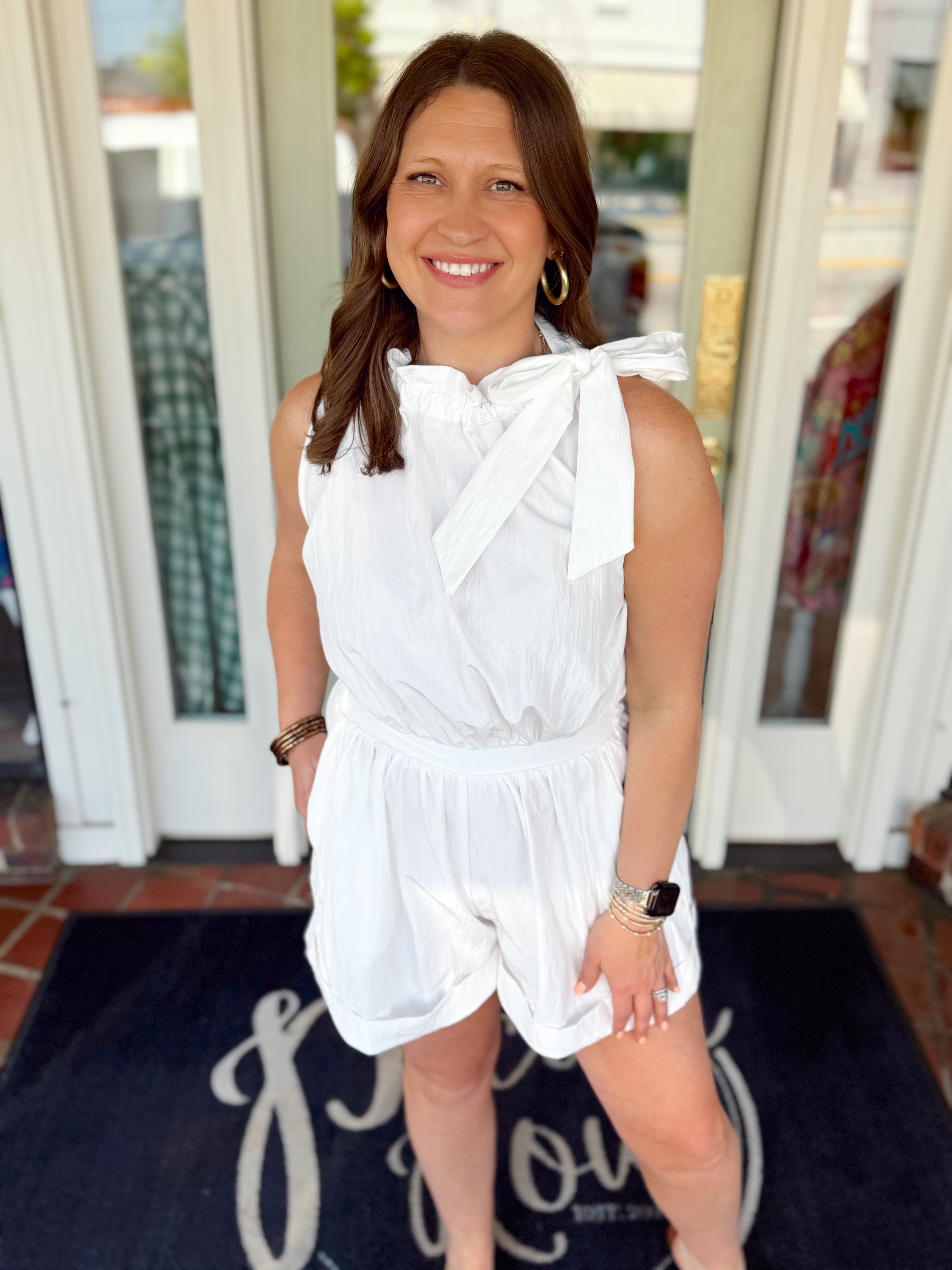 White ruffle neck tie romper with pockets 