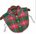  This festive detachable collar features a classic red and green plaid print with sparkling green jeweled embellishments along the collar points. 