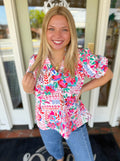 Colorful floral top with subtle puff sleeves