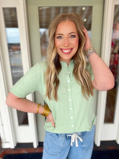 Light Green button down sweater than can be worn as a cardigan