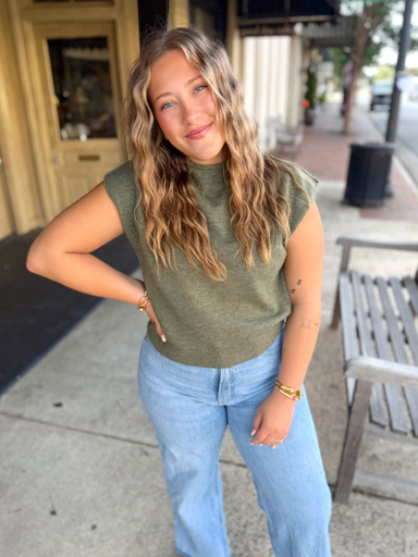 A sleeveless knit sweater top