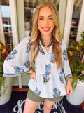 Blue and green floral top with flutter sleeves by mary square