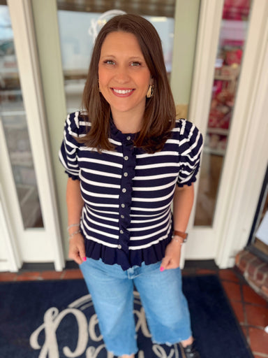 Navy and white striped top with ruffle detail
