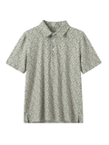 This short sleeve polo features an allover abstract grass-outdoorsy inspired print in soft neutral green tones for a subtle outdoorsy look that still feels polished.