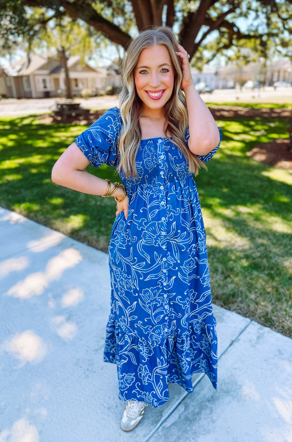 Floral print maxi dress with smocking detail and buttons down the front 