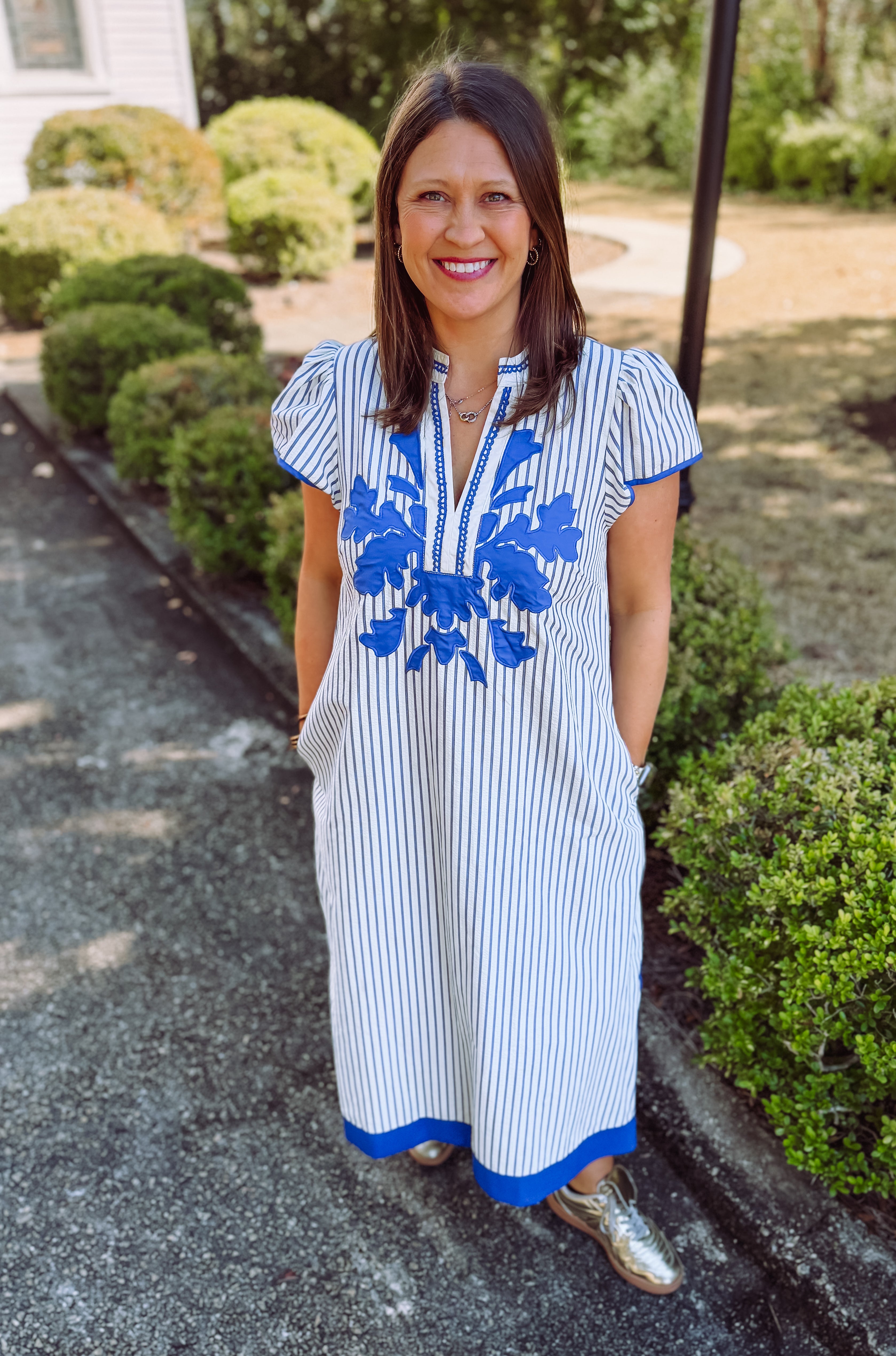 Blue and white v-neck pinstripe midi dress with embroidery and pockets