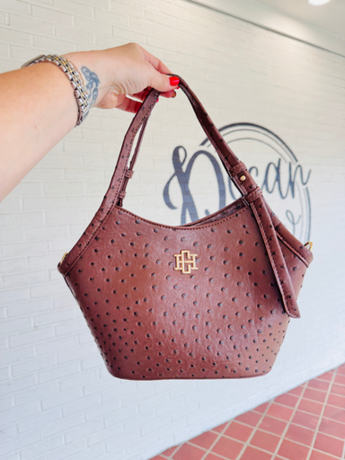 Brown Saddle textured bag with long strap