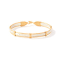 Gold and white bracelet on a white background