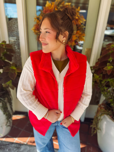 lined fur vest with one hook to close the top 