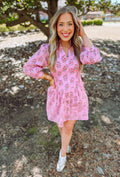 Pink floral mini dress with buttons down the front 